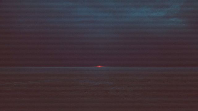 A Sunset Over A Body Of Water With Marfa Lights In The Background — Black/Dark wallpaper in 1920x1080