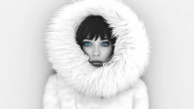 Blue-Eyed Girl in White Fur wallpaper
